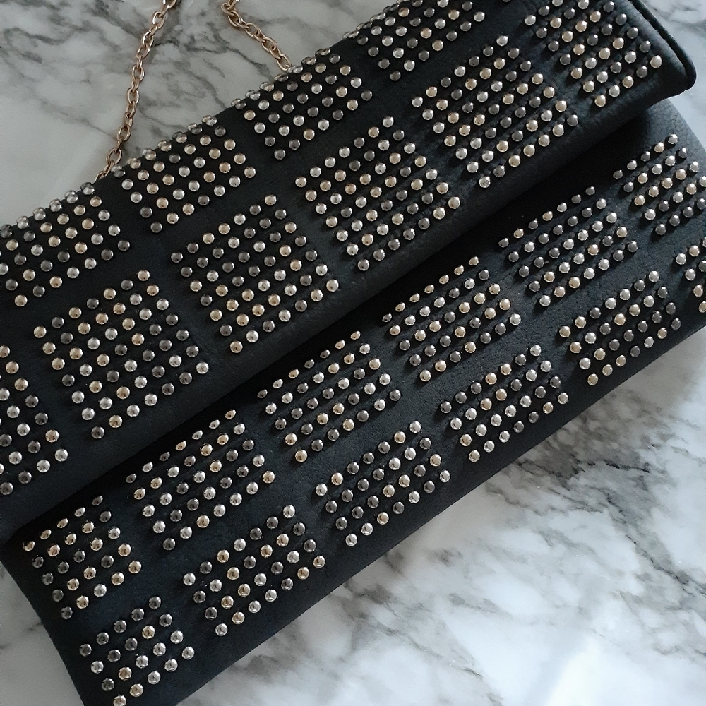 Black studded clutch